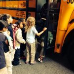Children Boarding Bus